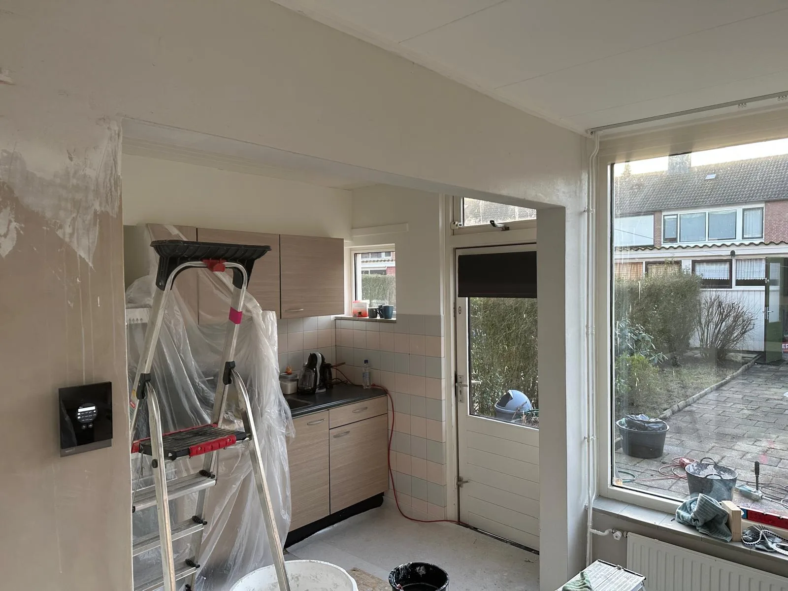 Keuken open maken resultaat — boog opening tussen woonkamer en keuken